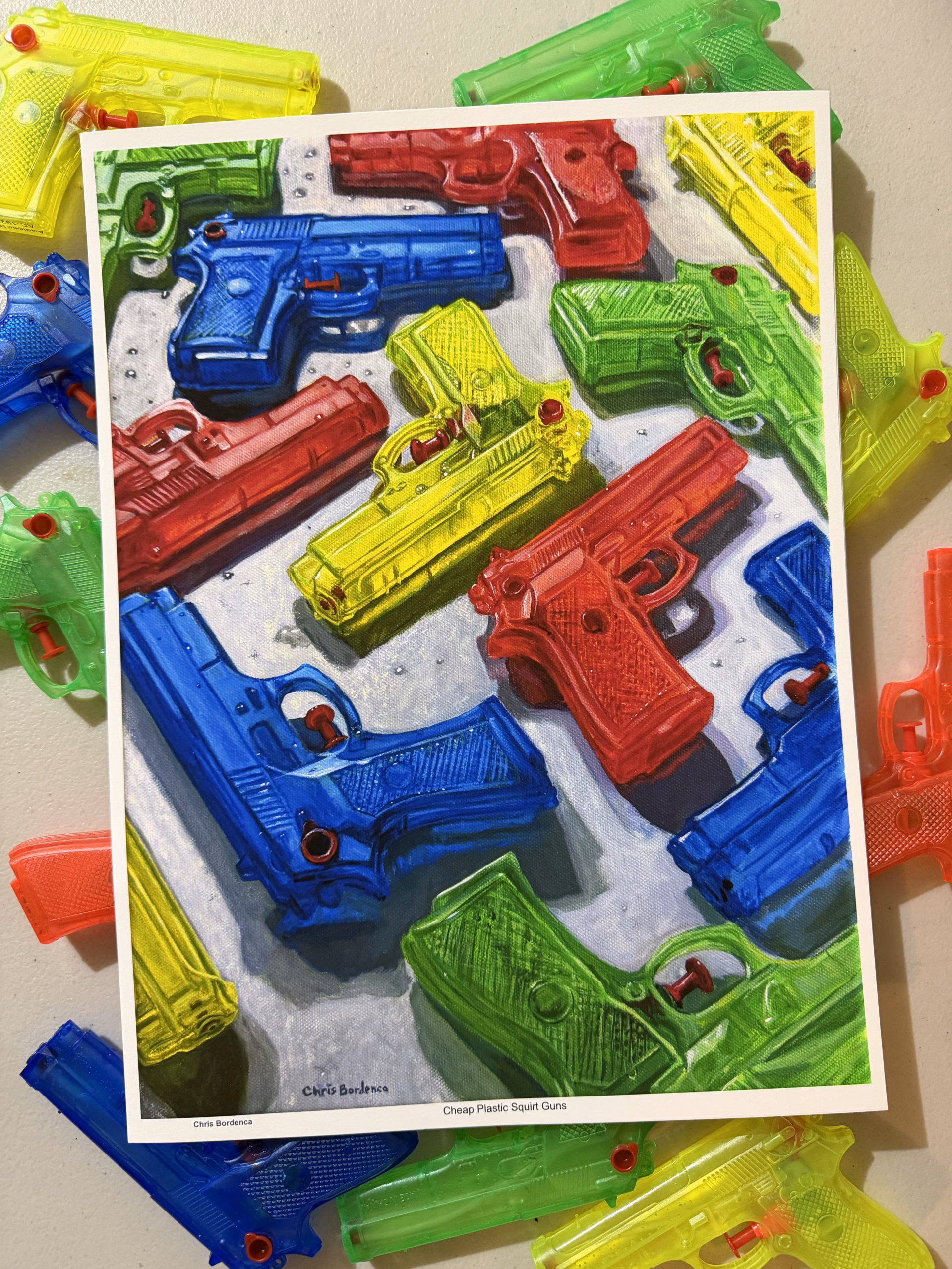 Cheap Plastic Squirt Guns- 12”x16” print - Image 2